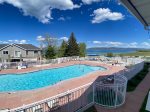 View form deck of Outdoor heated seasonal pool with view of lake